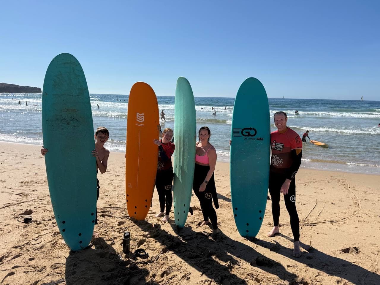 The four of us post-surf lesson.